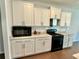 Well-equipped kitchen with modern appliances, granite countertops, and plenty of cabinet space at 5599 Wheeler Ridge Rd, Auburn, GA 30011