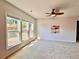 Bright living room with large windows that fill the space with natural light and create a warm atmosphere at 5599 Wheeler Ridge Rd, Auburn, GA 30011