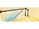 Staircase with carpeted steps and white wood railing at 5599 Wheeler Ridge Rd, Auburn, GA 30011