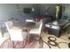 Spacious game room with air hockey table, foosball, and comfortable seating arrangement at 5626 Laurel Ridge Dr, Atlanta, GA 30344