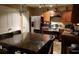 Cozy kitchen and dining area featuring stainless steel appliances and space for 6 at the dining table at 5626 Laurel Ridge Dr, Atlanta, GA 30344