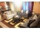 Spacious living room featuring couches, an area rug, lots of light, and an open layout at 5626 Laurel Ridge Dr, Atlanta, GA 30344