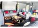 Living room inside a garage features comfortable sofas, a glass coffee table, and a decorative rug at 5626 Laurel Ridge Dr, Atlanta, GA 30344