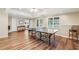 Finished basement features a large recreation area with a ping pong table, stylish floors and recessed lighting at 730 Mount Oglethorpe Trl, Alpharetta, GA 30022