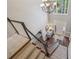 Inviting foyer with hardwood floors and a view from the stairs at 730 Mount Oglethorpe Trl, Alpharetta, GA 30022