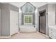 Bright primary bathroom featuring a garden tub, large window, and separate shower at 730 Mount Oglethorpe Trl, Alpharetta, GA 30022