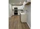 Modern kitchen with white cabinets, stainless steel appliances, and sleek countertops at 7562 Asbury Manor Dr, Lithonia, GA 30014