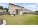 Fenced backyard featuring a patio area and a spacious lawn at 1998 Lakeview Bend Way, Buford, GA 30519