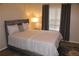Relaxing bedroom with a comfortable bed, soft lighting, and calming decor at 4190 Wingfoot Ct, Decatur, GA 30035