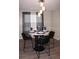 Cozy dining area with modern chandelier and stylish seating for a delightful meal at 4190 Wingfoot Ct, Decatur, GA 30035