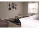 Bright living room featuring neutral paint, modern art, black/gray rug, and a cozy ambiance at 4190 Wingfoot Ct, Decatur, GA 30035