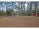 Spacious, fenced backyard perfect for outdoor activities and entertaining, with a wooded backdrop at 4222 Webb Rd, Tucker, GA 30084