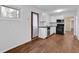 Well-lit kitchen with white cabinets and stainless steel appliances at 4222 Webb Rd, Tucker, GA 30084