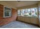 The sunroom has ample windows to enjoy the outdoor landscape at 4222 Webb Rd, Tucker, GA 30084