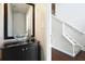Bathroom with vessel sink and black vanity at 1265 Birchwood Ln, Roswell, GA 30076