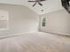 Neutral bedroom with vaulted ceilings, ceiling fan, and plenty of natural light at 1265 Birchwood Ln, Roswell, GA 30076