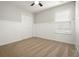 Bedroom with neutral walls, carpeting, and double door closet at 1265 Birchwood Ln, Roswell, GA 30076