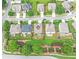 Overhead view of home with manicured lawn and mature trees at 2325 Lake Cove Ct, Buford, GA 30519
