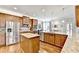 This eat-in kitchen features granite countertops, stainless steel appliances, and a large center island at 2325 Lake Cove Ct, Buford, GA 30519