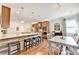 Modern kitchen featuring an island with breakfast bar and stainless steel appliances at 2325 Lake Cove Ct, Buford, GA 30519