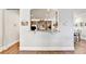 View of the kitchen featuring granite countertops and stainless steel appliances at 2325 Lake Cove Ct, Buford, GA 30519