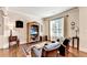 Inviting living room featuring hardwood floors, comfortable seating, and natural light in a well-appointed home at 2325 Lake Cove Ct, Buford, GA 30519