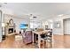 Comfortable living room with fireplace and dining area with breakfast bar at 2325 Lake Cove Ct, Buford, GA 30519