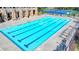Community swimming pool with lap lanes and lounge chairs at 2325 Lake Cove Ct, Buford, GA 30519