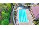 Community pool area with a long, rectangular pool for swimming laps at 2325 Lake Cove Ct, Buford, GA 30519