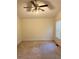 Large bedroom with neutral carpet, lit by a ceiling fan and natural light from the window at 2765 Dahlonega Trl, Austell, GA 30106