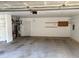 Spacious garage with ample room for parking and storage, featuring utility fixtures at 2765 Dahlonega Trl, Austell, GA 30106