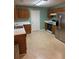 View of the kitchen featuring wooden cabinets at 2765 Dahlonega Trl, Austell, GA 30106