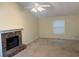 Inviting room with a stone fireplace and large windows at 2765 Dahlonega Trl, Austell, GA 30106