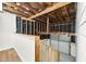 Unfinished basement with stairs, a support beam, and open ceiling at 5619 Beaver Sw Dr, Mableton, GA 30126