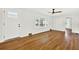 Bright living room with hardwood floors, a ceiling fan and lots of natural light at 5619 Beaver Sw Dr, Mableton, GA 30126