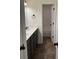 Well-lit bathroom with double sinks, stylish fixtures, and private toilet area at 5890 Crowley Dr, Douglasville, GA 30135