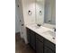 Double vanity in bathroom features white quartz countertops and modern fixtures at 5890 Crowley Dr, Douglasville, GA 30135