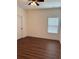 Bedroom featuring hardwood flooring and a ceiling fan at 5890 Crowley Dr, Douglasville, GA 30135