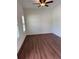 Simple bedroom with hardwood floors and natural light at 5890 Crowley Dr, Douglasville, GA 30135
