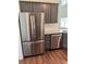 Modern kitchen featuring stainless steel appliances and granite countertops at 5890 Crowley Dr, Douglasville, GA 30135