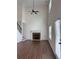 Bright living room with soaring ceilings, fireplace and hardwood floors at 5890 Crowley Dr, Douglasville, GA 30135
