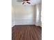 Cozy living room with wainscoting and rich hardwood floors at 5890 Crowley Dr, Douglasville, GA 30135