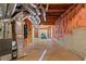 Unfinished basement with exposed ceiling joists and utilities, ready for customization at 619 Lovinggood Trl, Woodstock, GA 30189