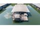 Aerial view of boat dock with multiple boat slips, providing ample space for watercraft and leisure at 619 Lovinggood Trl, Woodstock, GA 30189