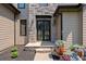 Close up of the entry way showing double front doors and stone accents at 619 Lovinggood Trl, Woodstock, GA 30189