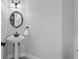 Simple powder room with modern sink and fixtures at 619 Lovinggood Trl, Woodstock, GA 30189