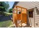 Outdoor shower featuring wood enclosure, stone pavers, and a private setting at 619 Lovinggood Trl, Woodstock, GA 30189