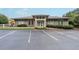 Community clubhouse exterior with ample parking and well-maintained landscaping at 1125 Fairview Club Cir, Dacula, GA 30019