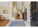 Grand foyer with tiled flooring, staircase, and views into the living spaces at 1125 Fairview Club Cir, Dacula, GA 30019