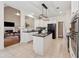 Modern kitchen with white cabinetry, stainless steel appliances, and a center island at 1125 Fairview Club Cir, Dacula, GA 30019